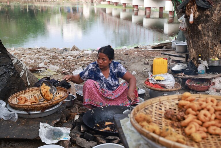 Myanmar woman cooking
